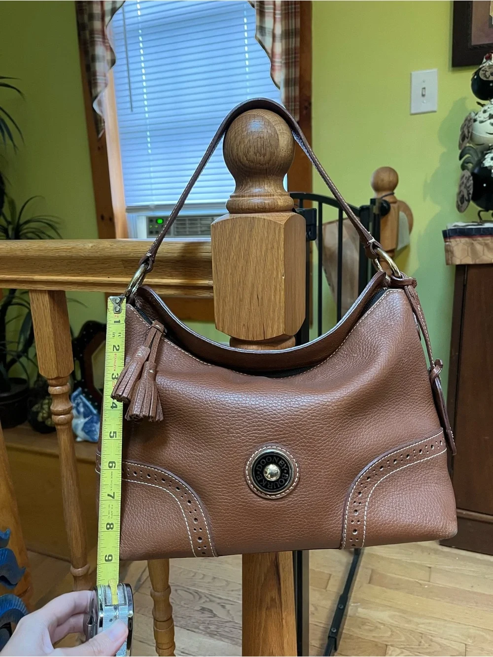 Dooney & Bourke Camel Brown Pebbled Leather Shoulder Bag with Tassel Emblem